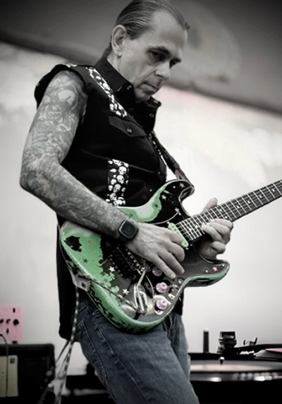 Robert Scott Conroy on guitar